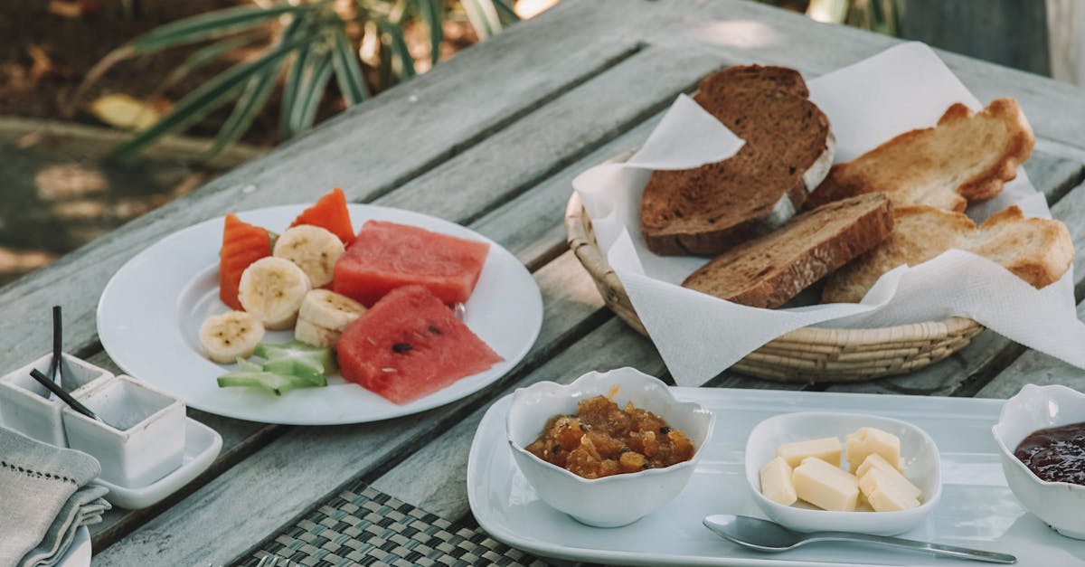 Delicious outdoor breakfast setting with fresh fruits and bread in Sri Lanka.